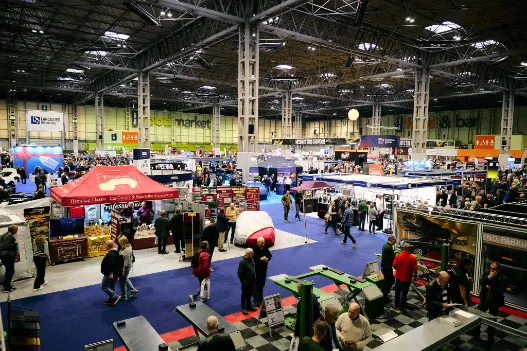 Bustling exhibit hall at the Classic Motor Show 2025