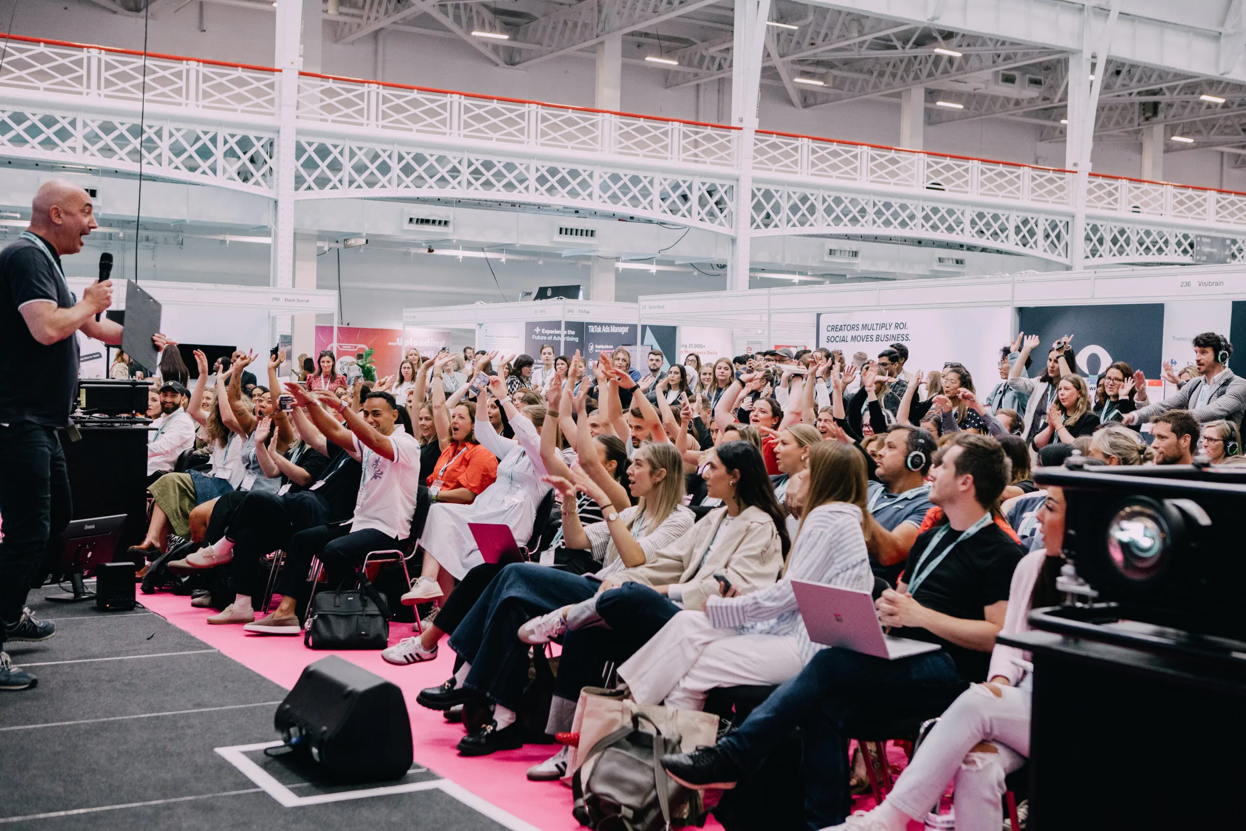 Engaged audience at #DMWF Global 2026 are immersed in insightful presentations.